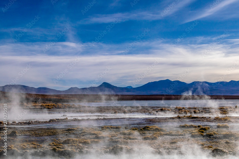 Aguas termales de Polques, hot springs with a pool of steaming natural thermal water in Bolivia