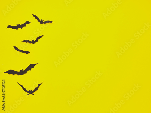 Halloween decorations, bats on a yellow background