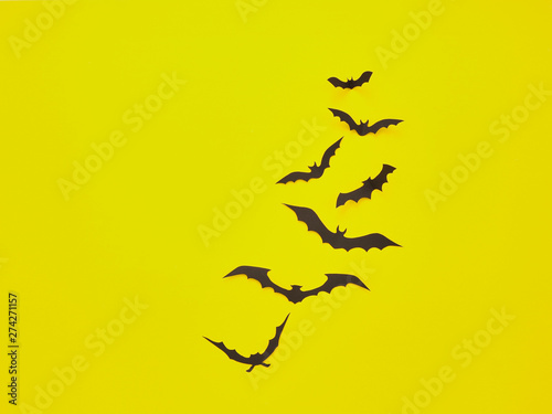 Halloween decorations, bats on a yellow background