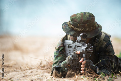 soldier with gun fighting o...