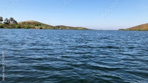 Lake view of forward motion blue skies