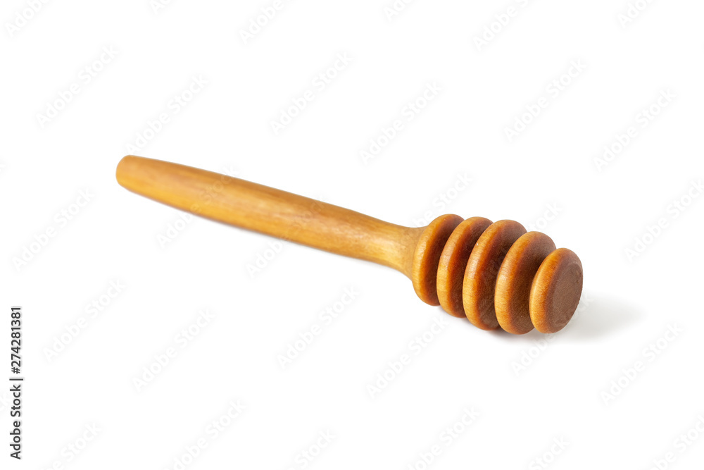 Honey dipper or special spoon for honey made of wood, isolated on white background Honey dipper or special spoon for honey made of wood, isolated on white background