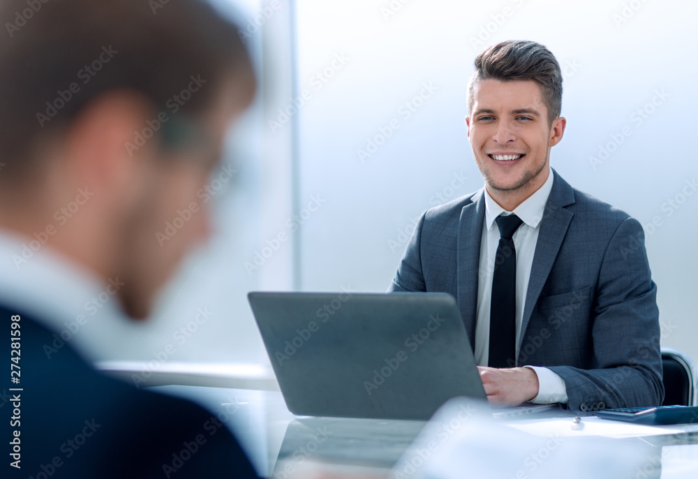 Two businessmen at work in office