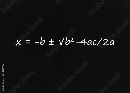 Quadratic Formula written on blackboard