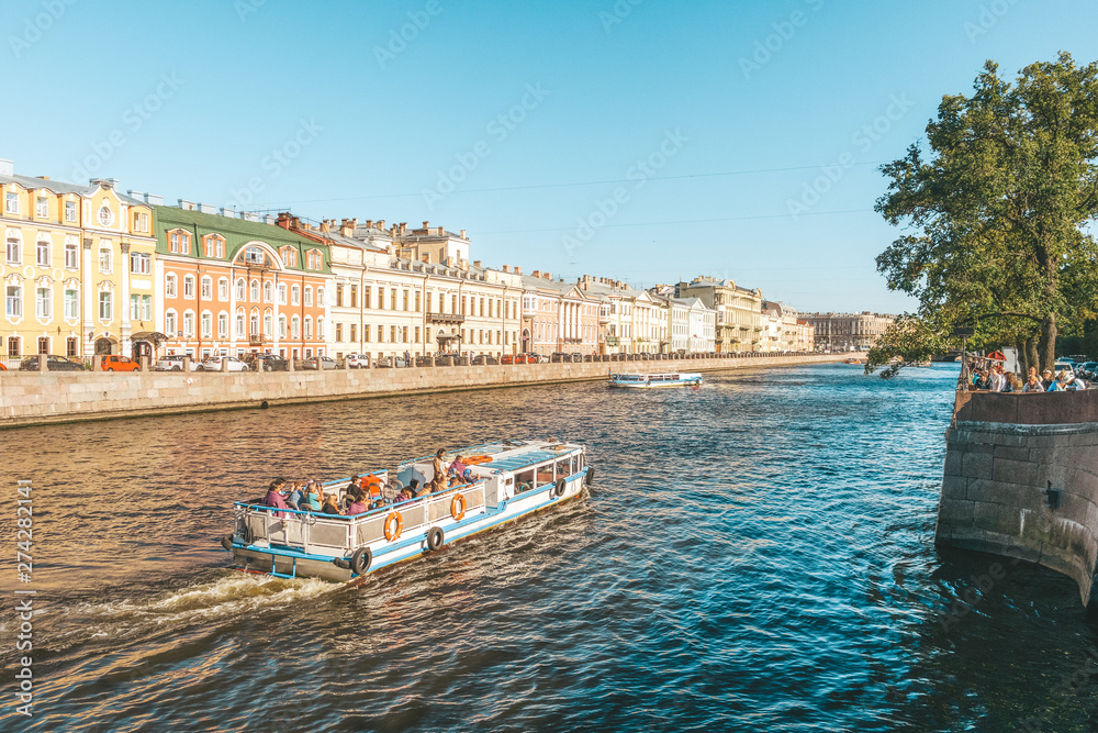 Obraz premium Cruise boats on Fontanka river, St. Petesburg, Russia