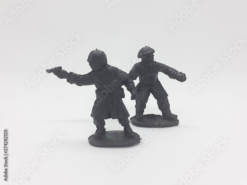Black Colored Plastic Army Men with Gun Toys for Kids in White Isolated Background