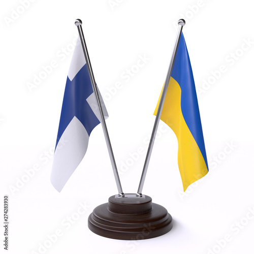 Finland and Ukraine, two table flags isolated on white background. 3d image