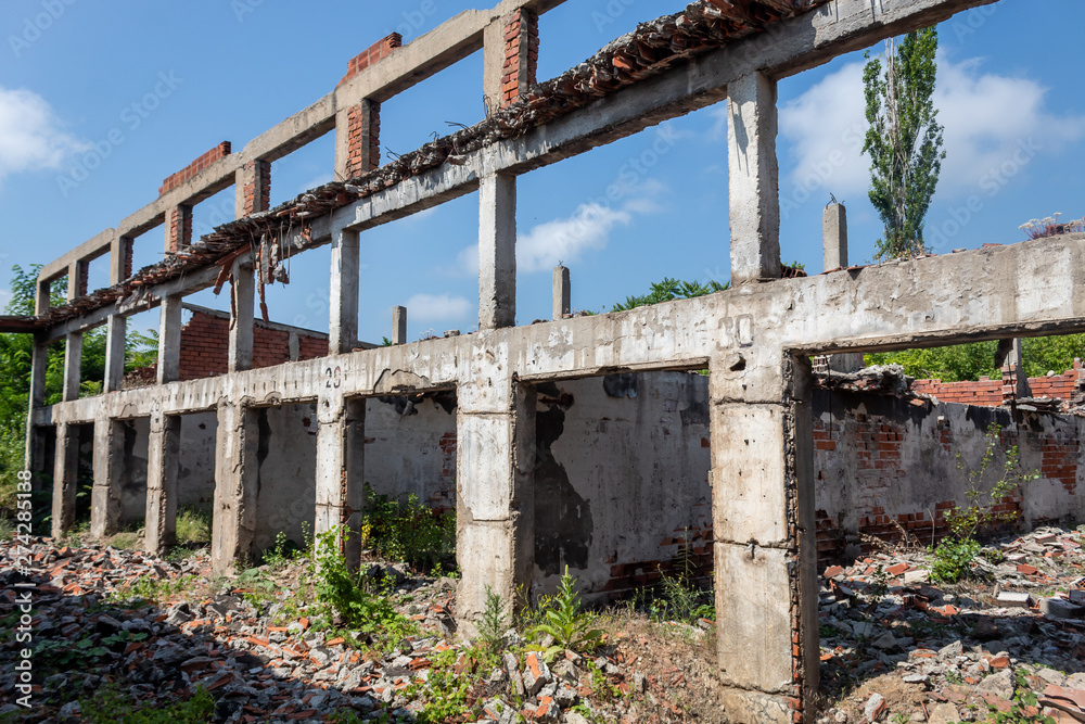 Construction Red Brick Walls, Columns and Beams in Heavily Damaged and Ruined Abandoned Building Construction Red Brick Walls, Columns and Beams in Heavily Damaged and Ruined Abandoned Building