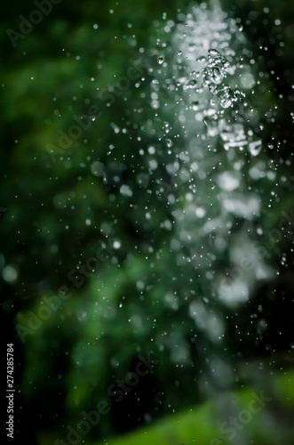 BLURRY HUGE RAIN DROP IN THE DARK IN THE PARK © PIOTR JARCZYKOWSKI