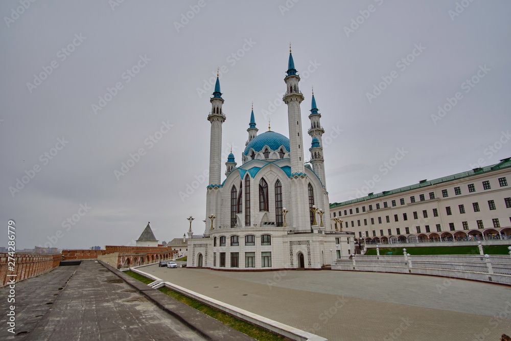 Scenic view of modern mosque Kul-Sharif in kremlin in historic center of old city Kazan in Russia. Beautiful cloudy summer look of muslim temple in historic part of capital of Tatarstan republic