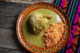 Mexican chicken with green mole sauce and red rice