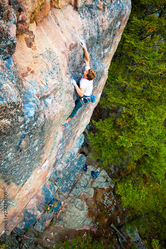 A man kills it softly on Straw Man (5.13a) on the Cube in Gallatin Canyon. photo