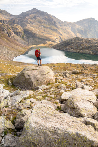 Spronser Lakes Hike, South Tyrol, Italy: A female hiker above the 