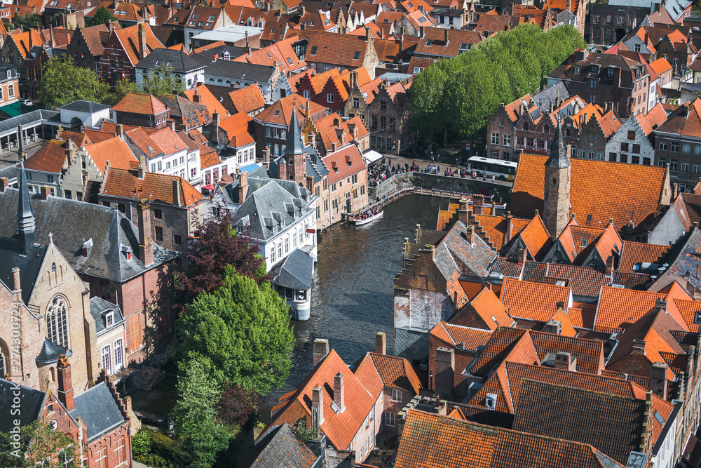 Obraz premium Famous tourist destination for photos in Bruges, Belgium. Aerial view, view from the Belfort tower.
