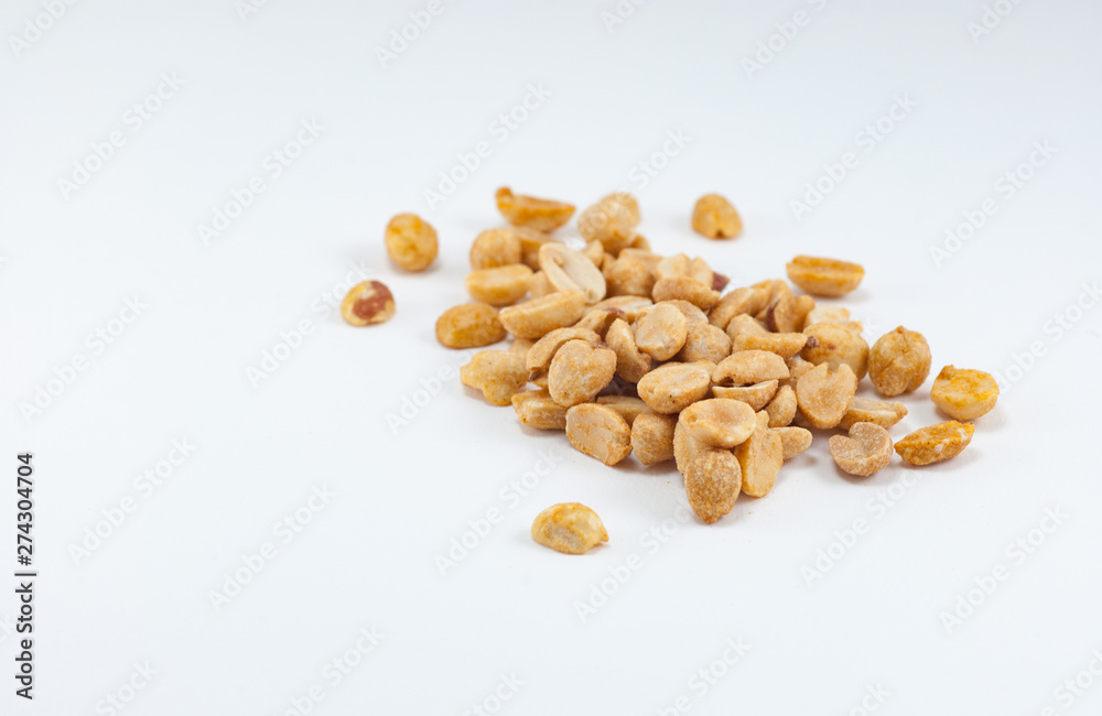 Color photo of peanuts on an isolated white background with room for copy. Color photo of peanuts on an isolated white background with room for copy.