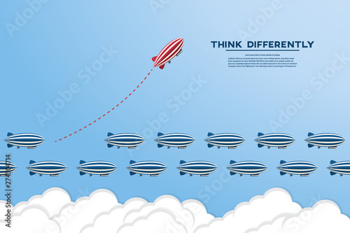 Think differently concept. Be different. Red zeppelin changing direction. New idea, change, trend, courage, creative solution, innovation and unique way concept.