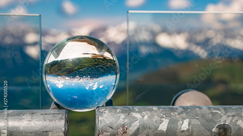 Crystal ball alpine landscape shot at Hohe Salve summit - Söll - Tyrol - Austria © Martin Erdniss