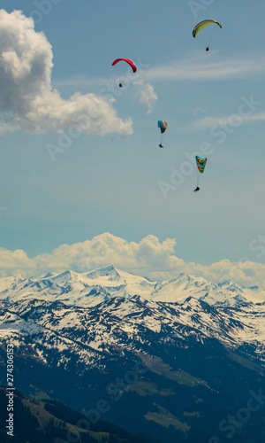 Beautiful alpine view with paragliders at Hohe Salve summit - Söll - Tyrol - Austria