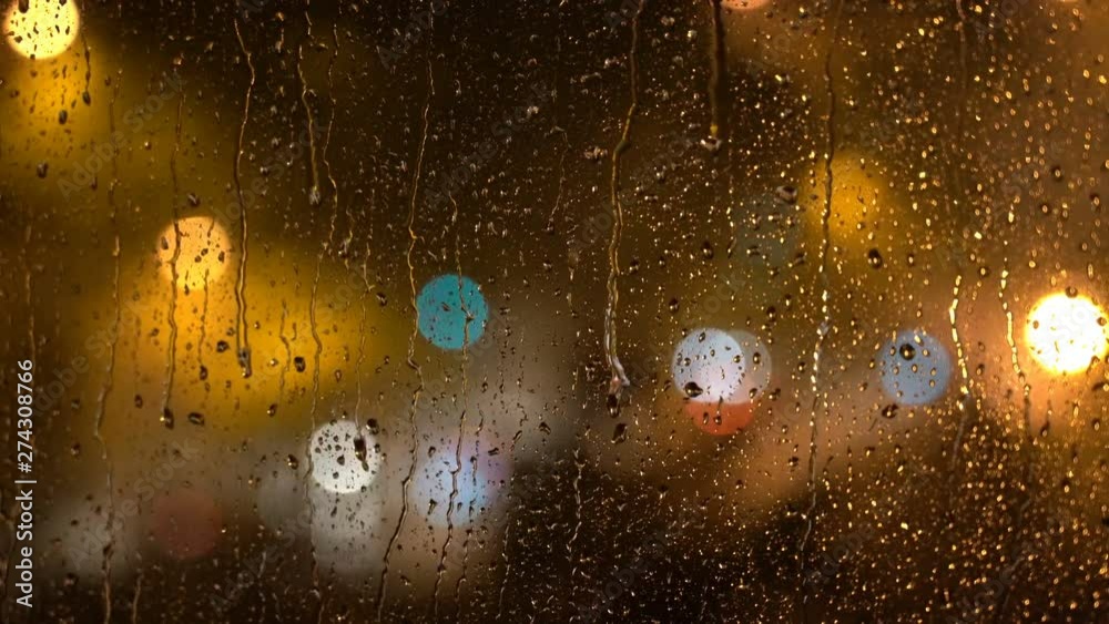 Night City in a Rainstorm - View Through an Apartment Window