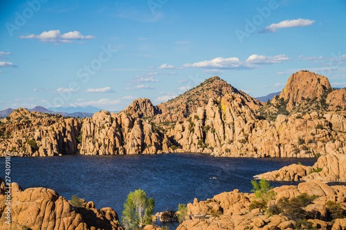The rugged beauty of Watson Lake in Prescott Arizona. This reservoir is surrounded be weathered cliffs of the Granite Dells and blear blue skies.