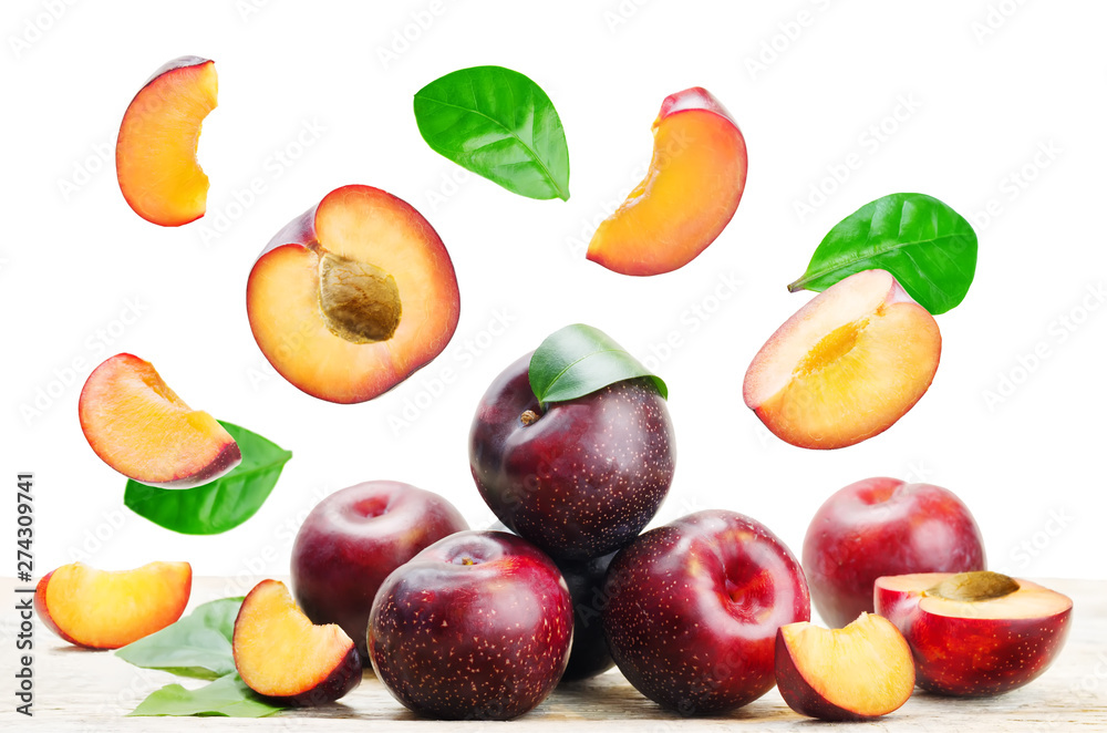plums with flying slices plums with flying slices