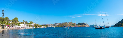 View of Bodrum Beach, Aegean sea, traditional white houses, marina, sailing boats, yachts in Bodrum town Turkey. 