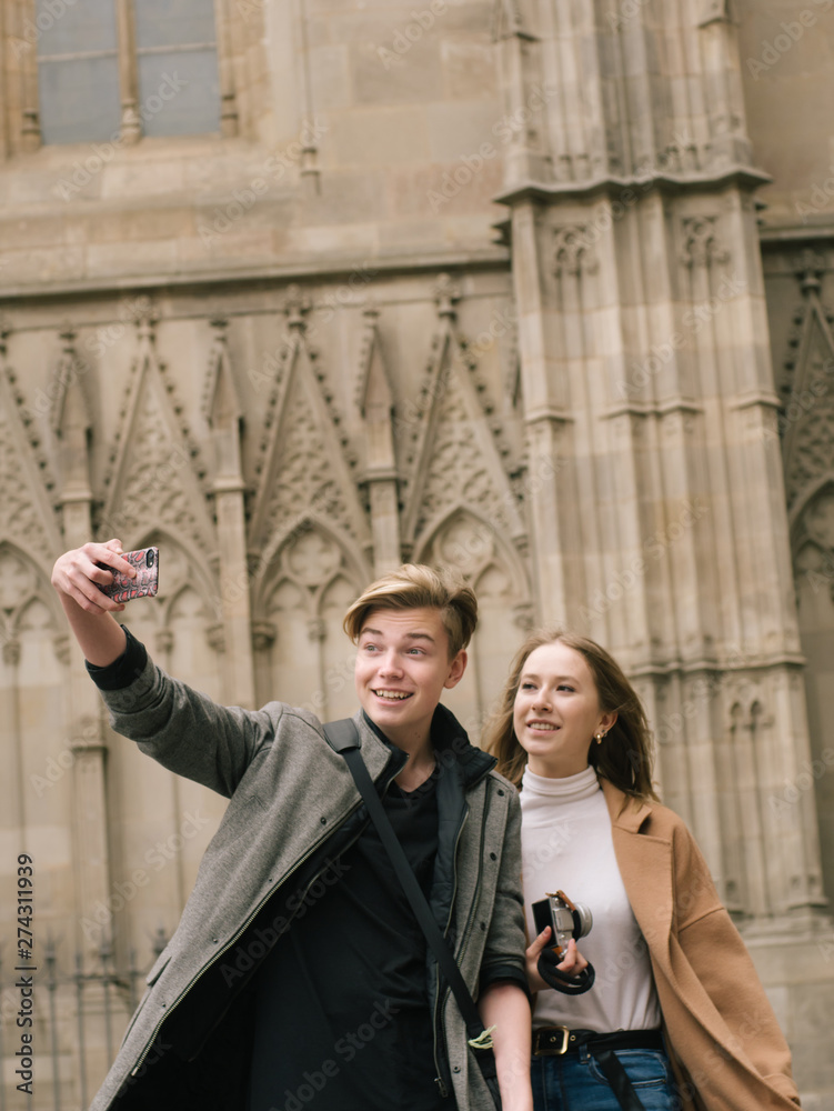 Young friends making a selfie during their walk.