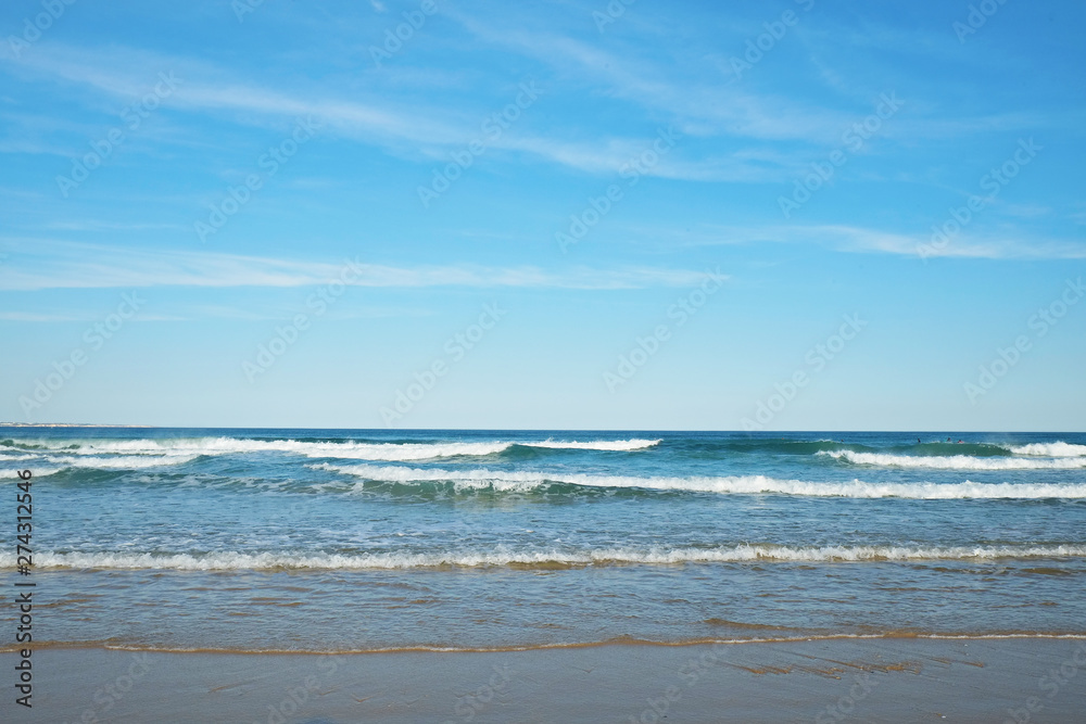 Beautiful panoramic view of sandy beaches somwhere in Algarve, Portugal. Copy space for text, clean turquoise Ocean water background. Beautiful panoramic view of sandy beaches somwhere in Algarve, Portugal. Copy space for text, clean turquoise Ocean water background.