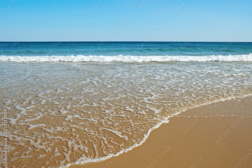 Beautiful panoramic view of sandy beaches somwhere in Algarve, Portugal. Copy space for text, clean turquoise Ocean water background. Beautiful panoramic view of sandy beaches somwhere in Algarve, Portugal. Copy space for text, clean turquoise Ocean water background.