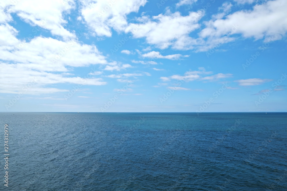 Beautiful panoramic sea view from the beach somwhere in Algarve, Portugal. Copy space for text, clean turquoise Ocean water background. Beautiful panoramic sea view from the beach somwhere in Algarve, Portugal. Copy space for text, clean turquoise Ocean water background.