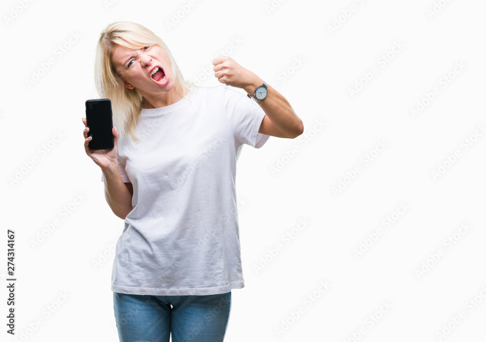Fototapeta premium Young beautiful blonde woman showing screen of smartphone over isolated background annoyed and frustrated shouting with anger, crazy and yelling with raised hand, anger concept