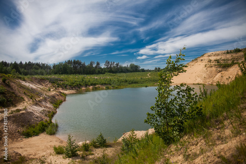 Blue sky and lake in the sand quarry