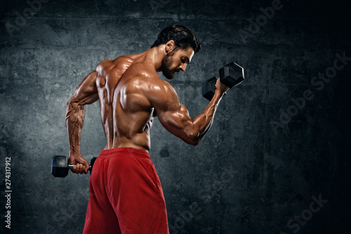 Bodybuilder Exercise With D...
