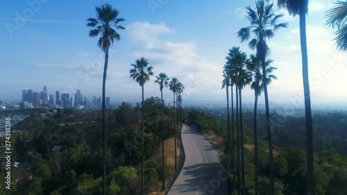 Drone clip over winding road in hills above Los Angeles - 4k UHD