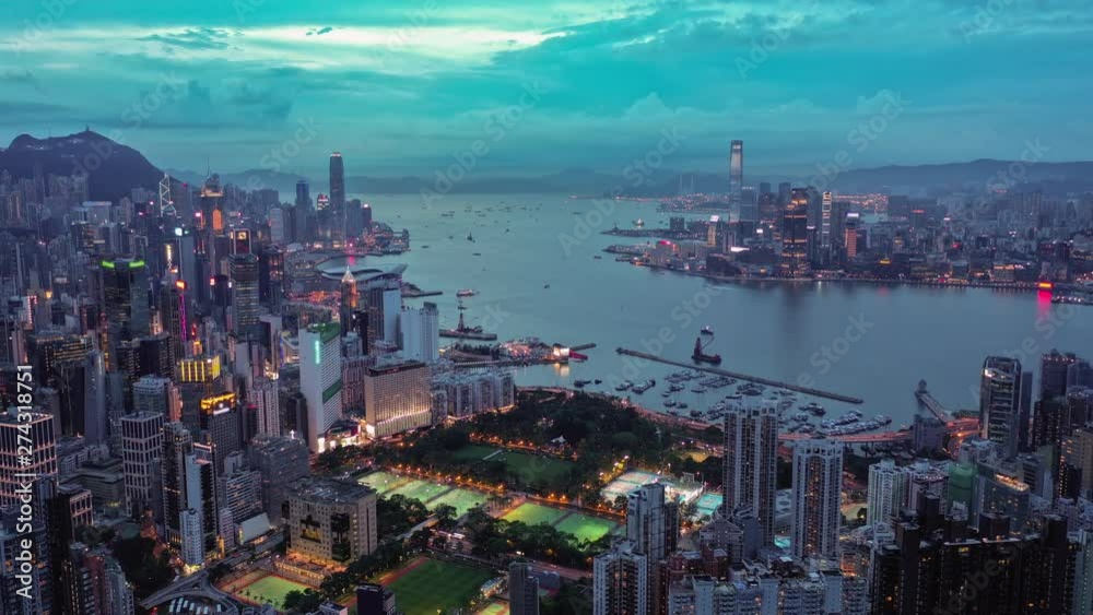 4k aerial hyperlapse video of Victoria Harbour in Hong Kong at sunset