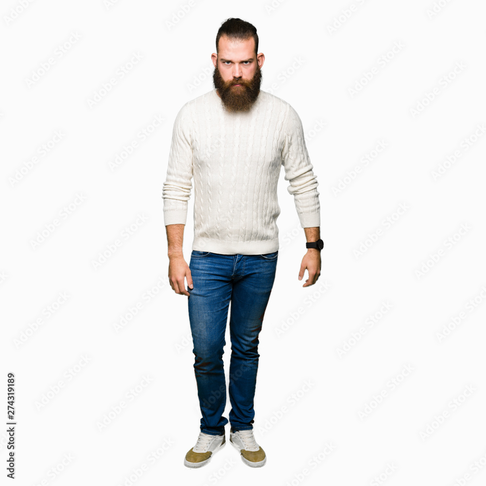 Young hipster man wearing winter sweater skeptic and nervous, frowning upset because of problem. Negative person. Young hipster man wearing winter sweater skeptic and nervous, frowning upset because of problem. Negative person.