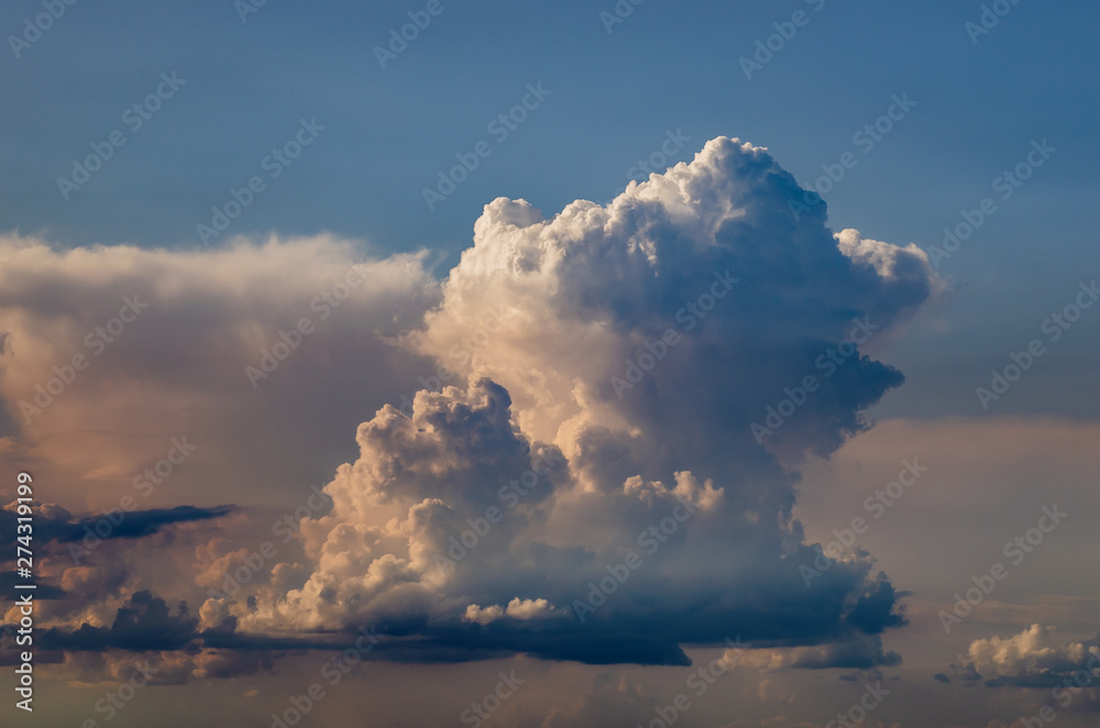 Beautiful stormy cumulus clouds in the sky, background. Beautiful stormy cumulus clouds in the sky, background.