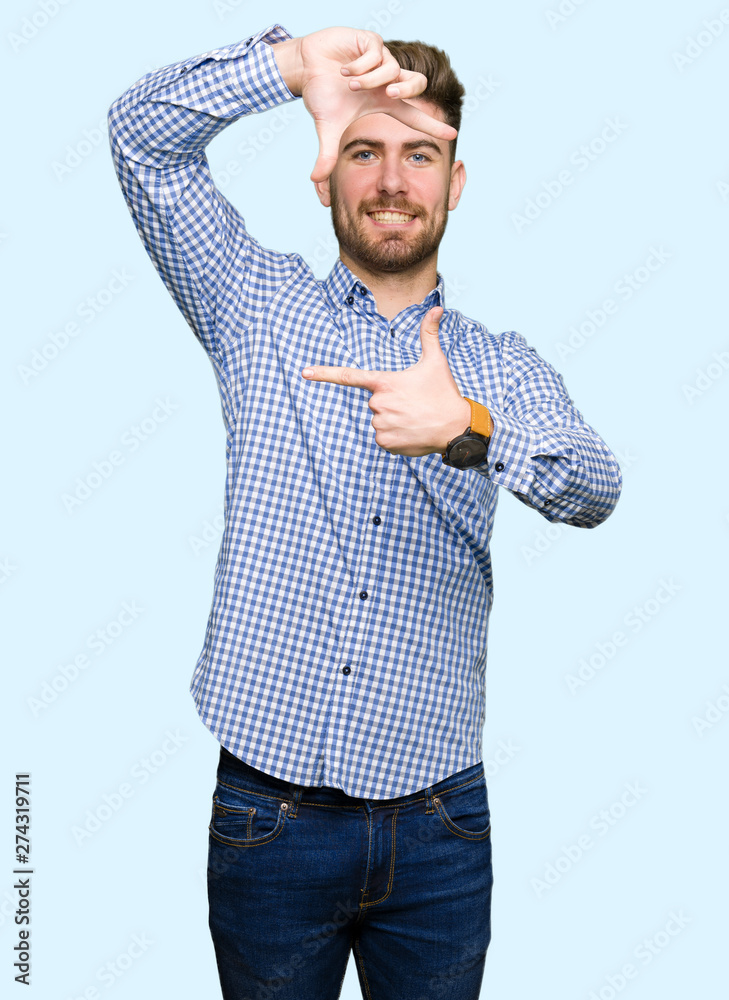 Young handsome bussines man smiling making frame with hands and fingers with happy face. Creativity and photography concept. Young handsome bussines man smiling making frame with hands and fingers with happy face. Creativity and photography concept.