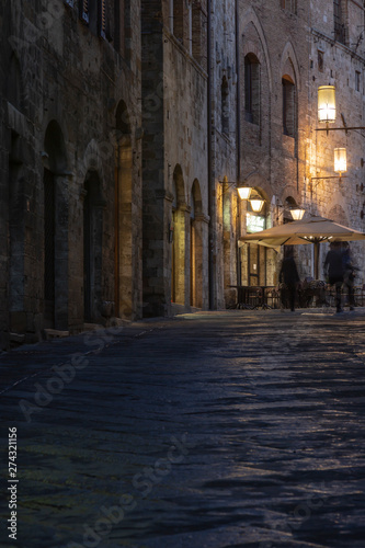 Medieval streets of San Gimignano at night, Tuscany, Italy © Krystyna