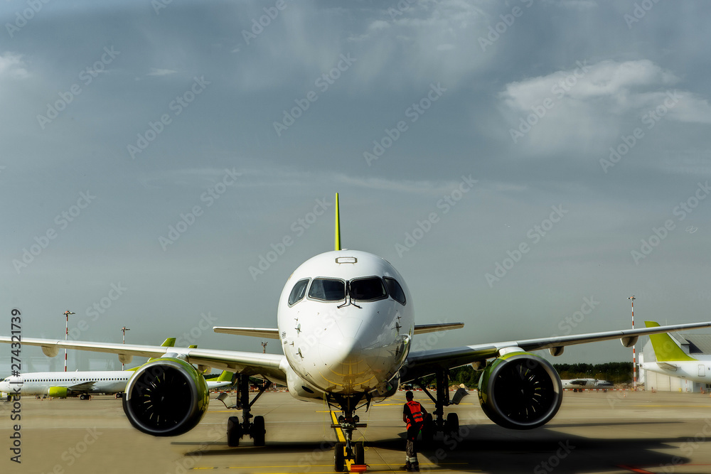 Naklejka premium at the airport, the plane taking off