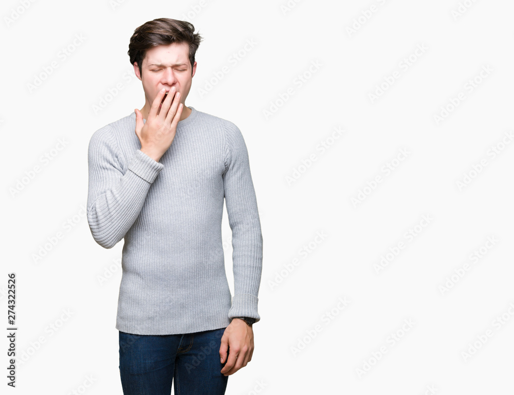 Young handsome man wearing winter sweater over isolated background bored yawning tired covering mouth with hand. Restless and sleepiness. Young handsome man wearing winter sweater over isolated background bored yawning tired covering mouth with hand. Restless and sleepiness.