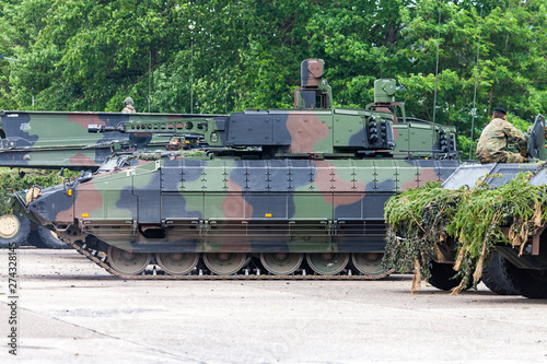 German infantry fighting vehicle drives on a street photo