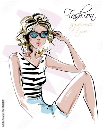 Hand drawn beautiful young woman in sunglasses. Stylish girl in summer clothes. Fashion woman look. Pretty tanned girl in shorts. Sketch. Vector illustration.