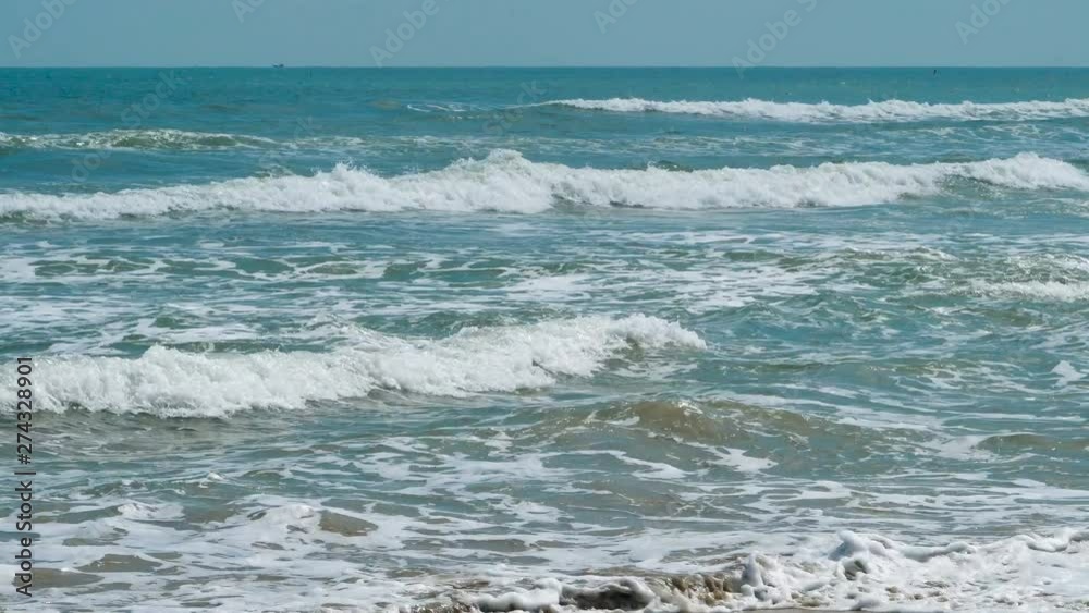 Waves in the sea and exotic beach in the summertime. Waves in the sea and exotic beach in the summertime.