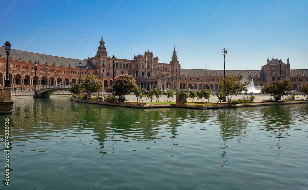 Overview of the Plaza de España in Seville from the water channel