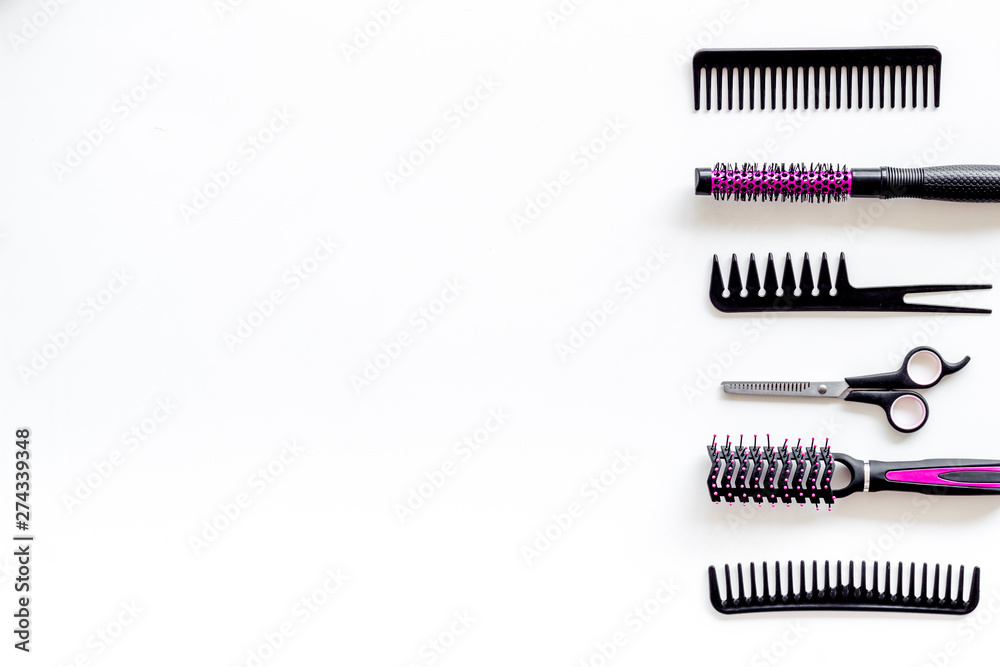 Set of professional hairdresser tools with combs and sciccors on white background top view mock up Set of professional hairdresser tools with combs and sciccors on white background top view mock up