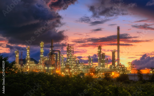Landscape of Oil and Gas Refinery Manufacturing Plant.  Petrochemical or Chemical Distillation Process Buildings.  Factory of Power and Energy Industrial at Twilight Sunrise.  Engineering Petroleum.