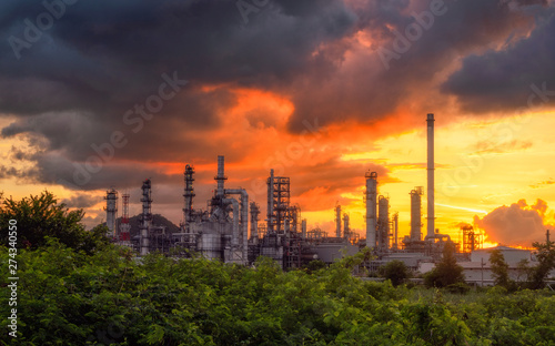 .Landscape of Oil and Gas Refinery Manufacturing Plant., Petrochemical or Chemical Distillation Process Buildings., Factory of Power and Energy Industrial at Twilight Sunset., Engineering Petroleum.