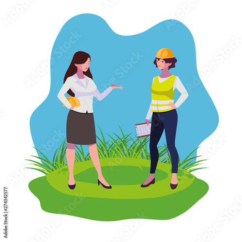 female builder and engineer woman on the lawn