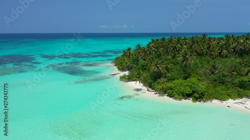 Aerial View of a White sand Beach on a Motu Island in Rangiroa Atoll, French Polynesia photo